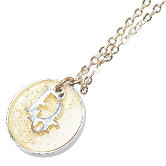 Christian Dior Dior CD logo necklace in silver and gold metal for women.